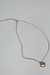 Украшение на шею из серебристой цепочки с бронзовой вставкой под чешую
